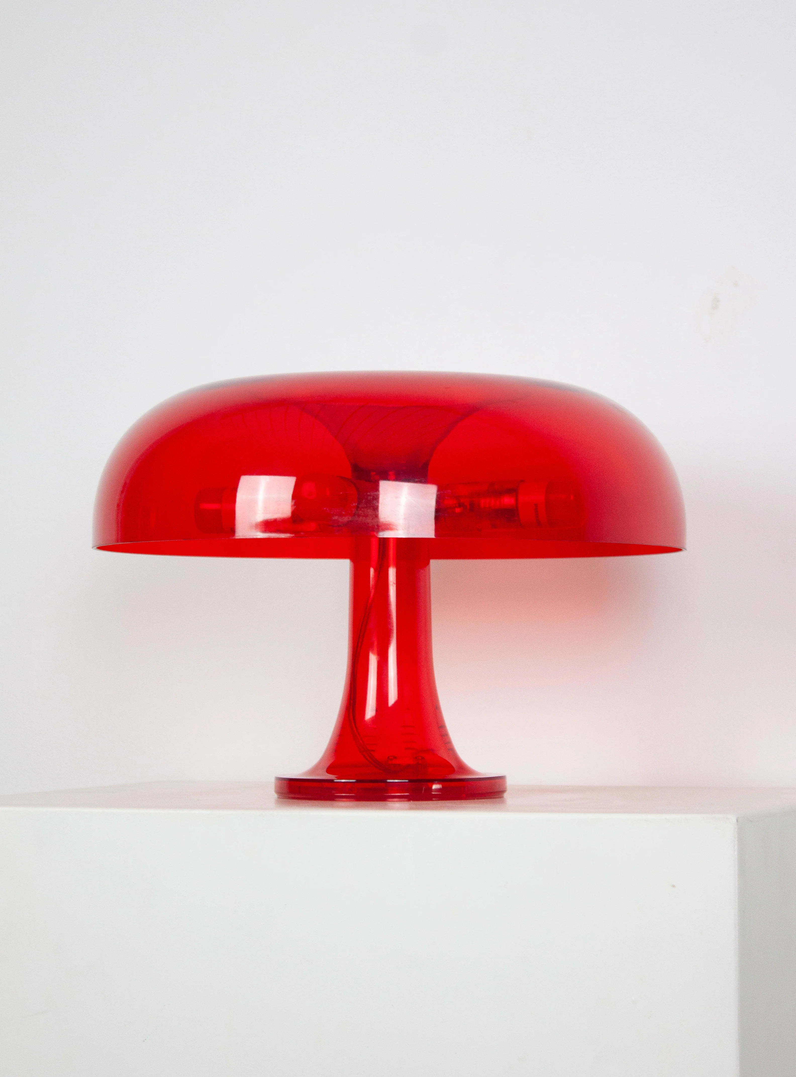 Artemide Nessino Table Lamp by Giancarlo Mattioli (Translucent Red)