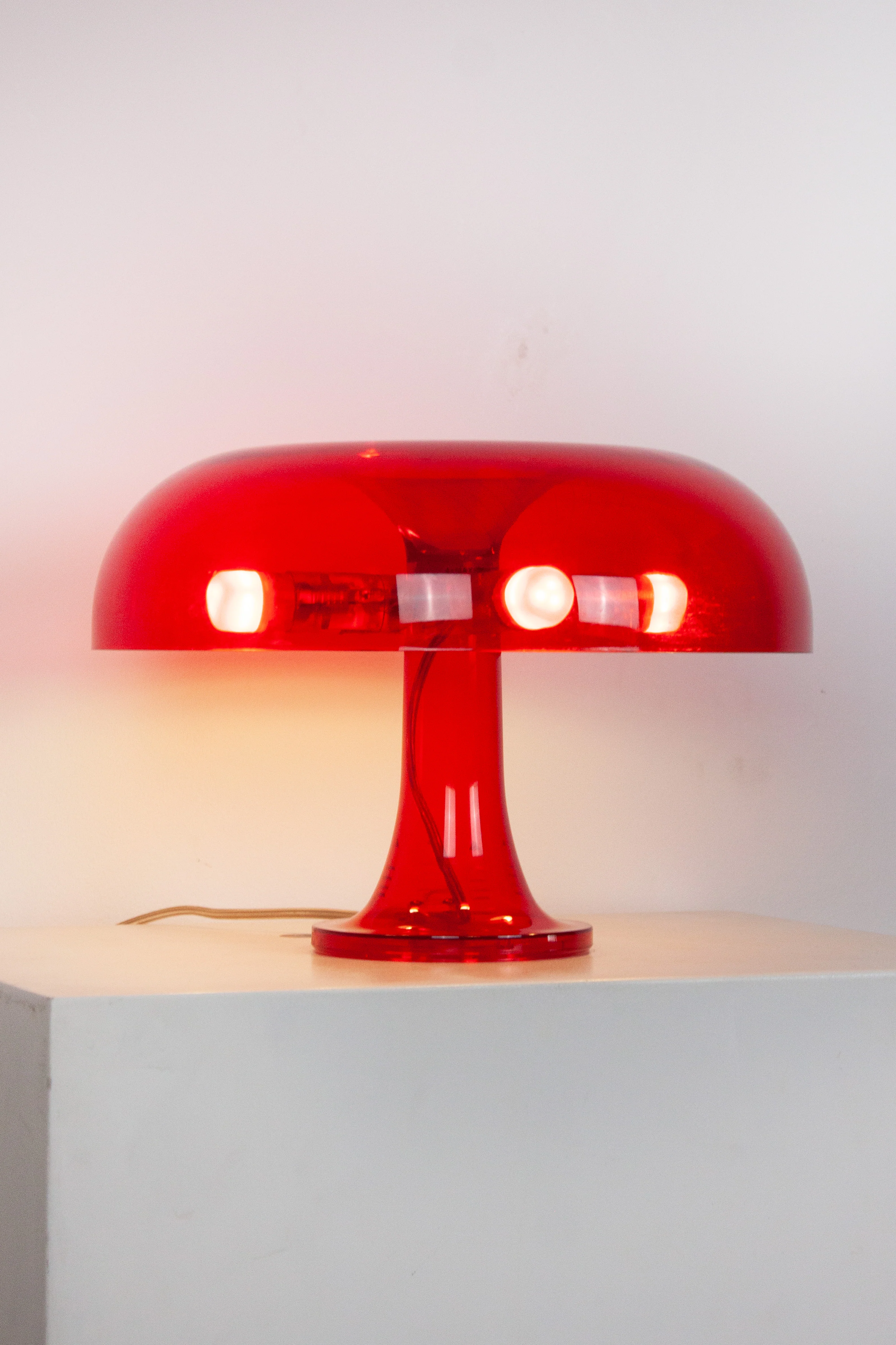 Artemide Nessino Table Lamp by Giancarlo Mattioli (Translucent Red) - Image 8